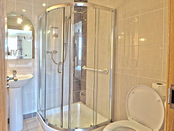 Spacious ensuite bathrooms with shower/WC/hand basin